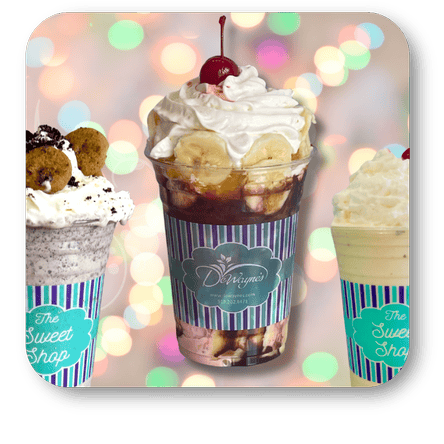 Decorative background with milkshakes with whipped cream, bananas, and a cherry on top, featuring a 'The Sweet Shop' label in the sweet shop at Dewayne's in Selma, NC minutes from Raleigh, Cary, Clayton, Garner, Smithfield, Goldsboro