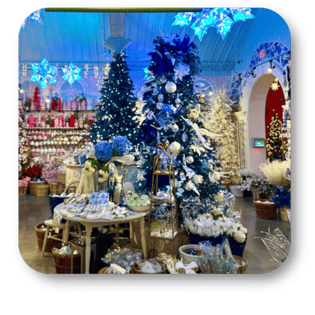 Decorative Christmas scene with Blue trees and ornaments  in Christmas Land at Dewayne's in Selma, NC minutes from Raleigh, Cary, Clayton, Garner, Smithfield, Goldsboro
