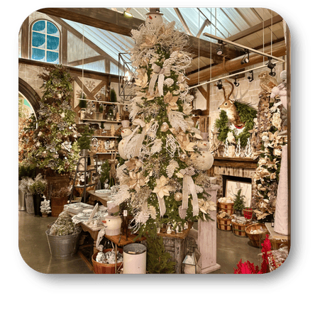 Decorated Christmas trees in a store with various ornaments in the country Christmas room of Christmas Land at Dewayne's in Selma, NC minutes from Raleigh, Cary, Clayton, Garner, Smithfield, Goldsboro