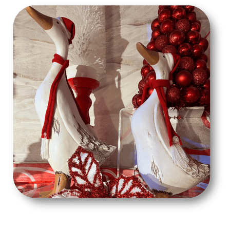 Decorative Christmas geese with red scarves and ornaments in the wrapped in red room in christmas land 2025 at Dewayne's in Selma, NC minutes from Raleigh, Cary, Clayton, Garner, Smithfield, Goldsboro